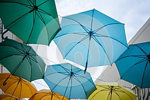 Street decorated with colored umbrellas. view of Umbrella Street