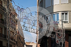 Street decoration with the text `Falla la Merce` as a sign for the `Fallas` celebration at the `Plaza de la Merce` in Valenc