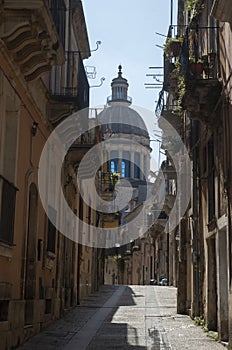 Street and dome of San Giorgio baroque city Ragusa Ibla, Sicilia, Italy photo