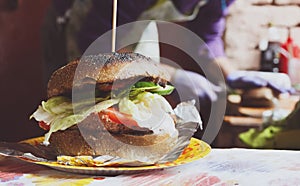 Street fast food, hamburger with bbq grilled steak