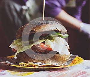 Street fast food, hamburger with bbq grilled steak