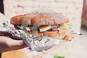 Street fast food, hamburger with bbq grilled steak