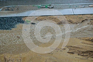 Street flooded heavy rain drops falling on street during downpour