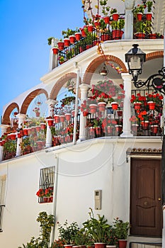 Street with flowers in the Mijas town, Spain