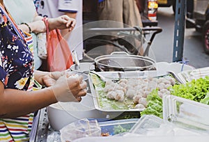 Street Food on China Town Yaowarat road, Bangkok, Thailand.