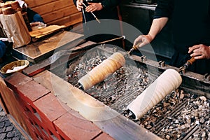 Street food at the Christmas market in Budapest, Hungary - Kurtoskalacs, the national classic pastry, also called -