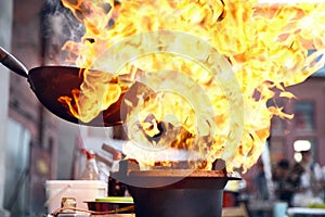 Street Food Festival. Cooking Food On Fire photo