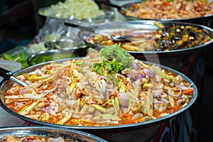 Street food market in Asia. Food counters