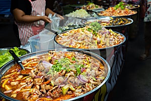 Street food market in Asia. Food counters