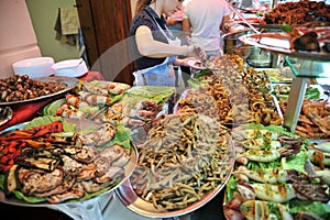 Street food in Palermo, Italy with prawns , squids, octopuses and tuna fish