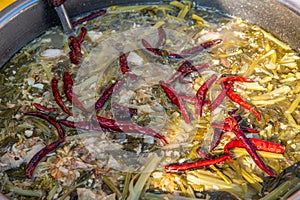 Street food - soup with thai chilis on top