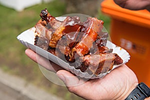 Street Food - Spareribs with sauce in a bowl