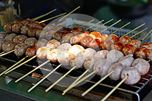 Street food Thai sausage or Esan sausage grill on stove