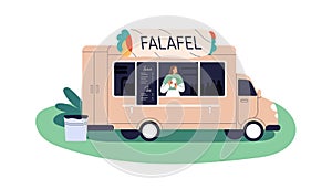 Street food truck, mobile cafe van selling falafel. Vendor at counter of caravan, snack shop on wheels outdoors. Seller photo