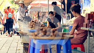 Street food vendors, Hanoo, Vietnam photo