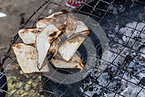 Street foods in Lagos Nigeria; grilled roasted yam