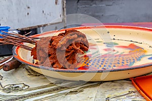 Street foods in Lagos Nigeria; Suya in a tray