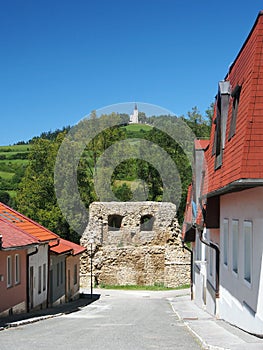 Street with fortification and Marian Hill in Levoca