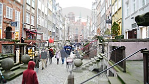 Street of Goldsmiths in historic old town of Gdansk in Poland - crowd, historic buildings and blurred picture