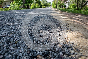 Street with gravel road. Private houses and sleeping area