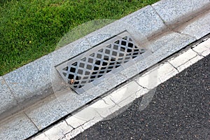 Street gutter of a stormwater drainage system photo