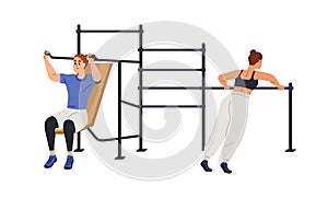 Street gym, workout sport ground. Young women exercising at athletic area. Active people, female training outdoor at