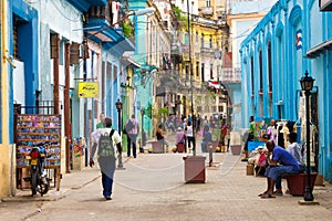 Street in Havana with people and old buildings