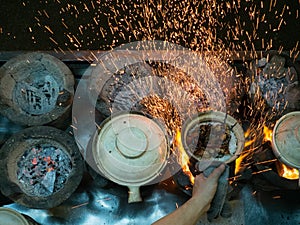 Street Hawker Cooking with Sparks Flying