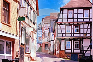 street of historic building, beautiful facade ancient half-timbered house of European German architecture, wood patterns, historic