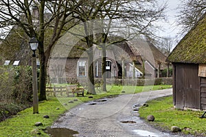 Street with historic farms en barns in Orvelte