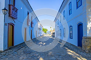 Street of historical center in Paraty, Rio de Janeiro, Brazil. Paraty is a preserved Portuguese colonial and Brazilian