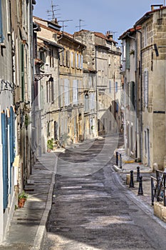 Street with historical houses in Arles, France