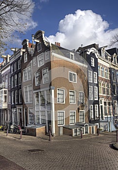 Street with historical  houses iin Amsterdam, Holland