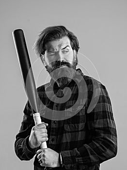 street hooligan with bat. man reliving stress. emotion control concept. brutal bearded man using baseball bat for