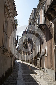 Street and houses in baroque city Ragusa Ibla, Sicilia, Italy photo