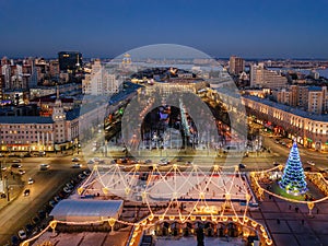 Street illumination during new year celebration in central square of Lenin in Voronezh, Russia, aerial view