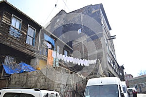 The street in Istanbul with old semi-suspended wooden houses.