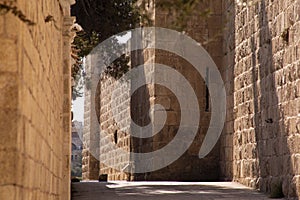 Street in Jerusalem next to the old city wall.  The city of three religions in the middle east. Israel.