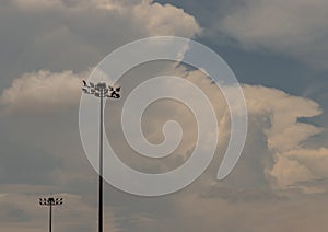 Street lamp against blue skies and white clouds