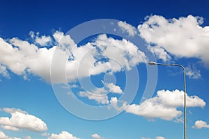 Street lamp against the cloudy sky