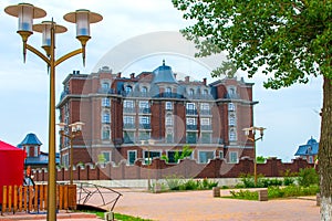 A street lamp and a beautiful old house. Park on the left bank in Rostov on Don