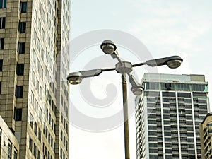 Street lamp with building and sky