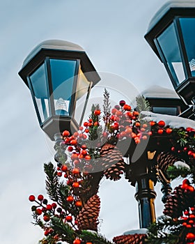 Street lamp decorated with christmas wreath