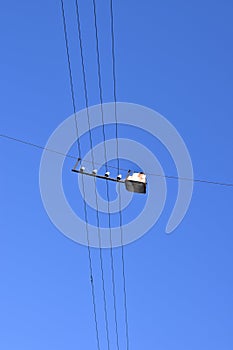 Street lamp hanging on wires