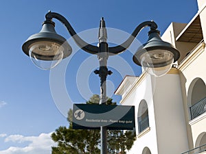 Street lamp with Keep Quiet sign