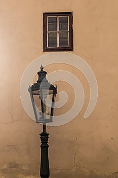 Street lamp - lantern and a window