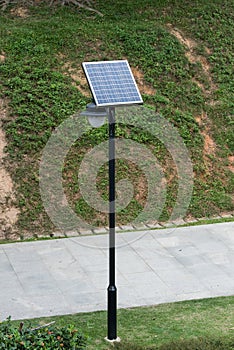 Street lamp post with solar panel energy