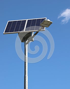 Street lamp powered by a photovoltaic panel is a group of batter