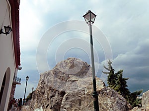 Street lamp and rocks on Skiathos island - Greece