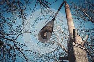 Street lamp. Street lantern with tree and sky in background
